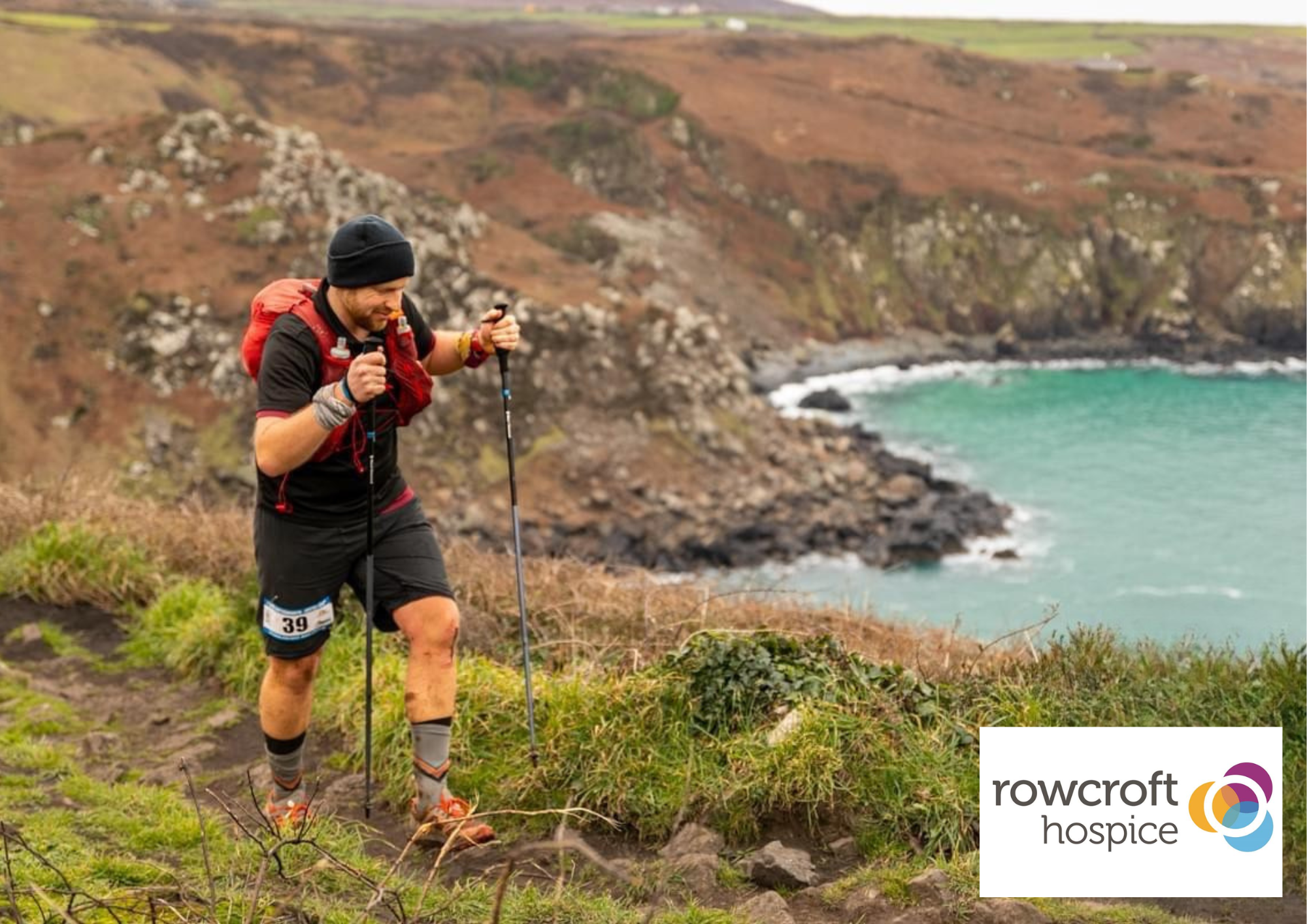 Dan running the South West Coast Path above the coast near Bantham for Rowcroft Hospice